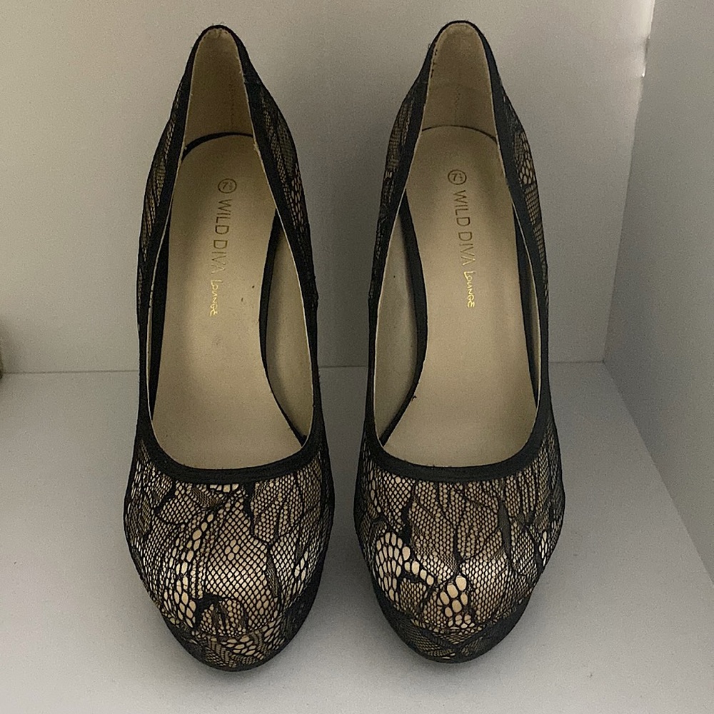 Nude and black lace heels